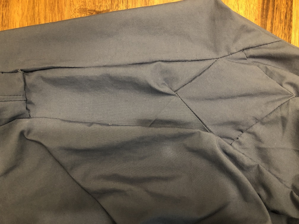 A close up of the side of the viking style underdress showing the underarm gusset and added side panel