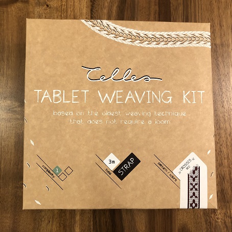 A photo of a box that reads Celles Tablet Weaving Kit